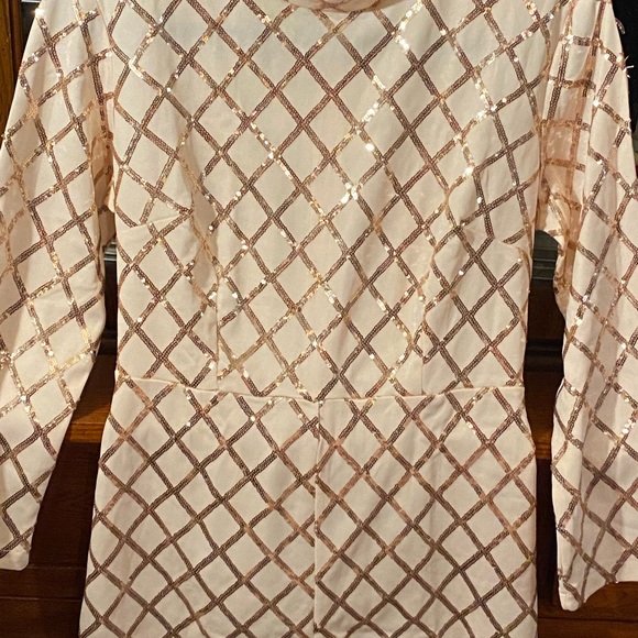 Blush and rose gold sequined long sleeved romper. - Picture 7 of 8